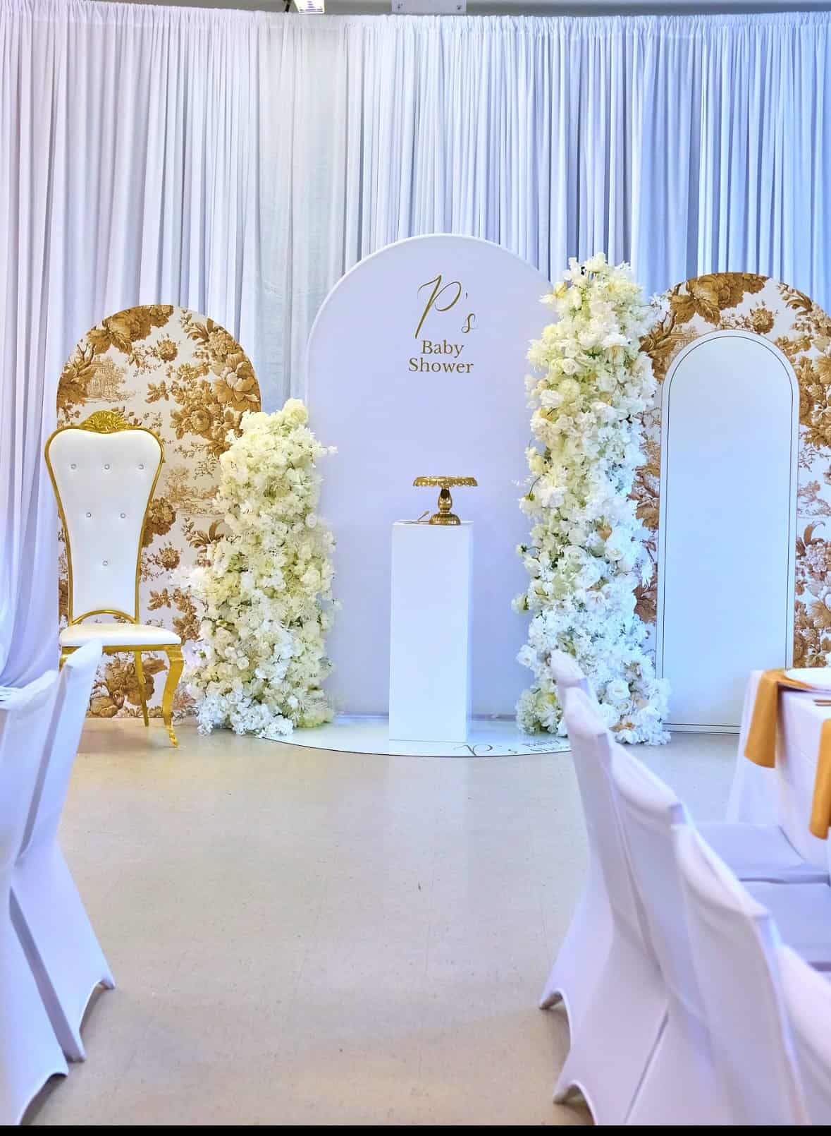 Luxury baby shower table decor with premium linens and candles