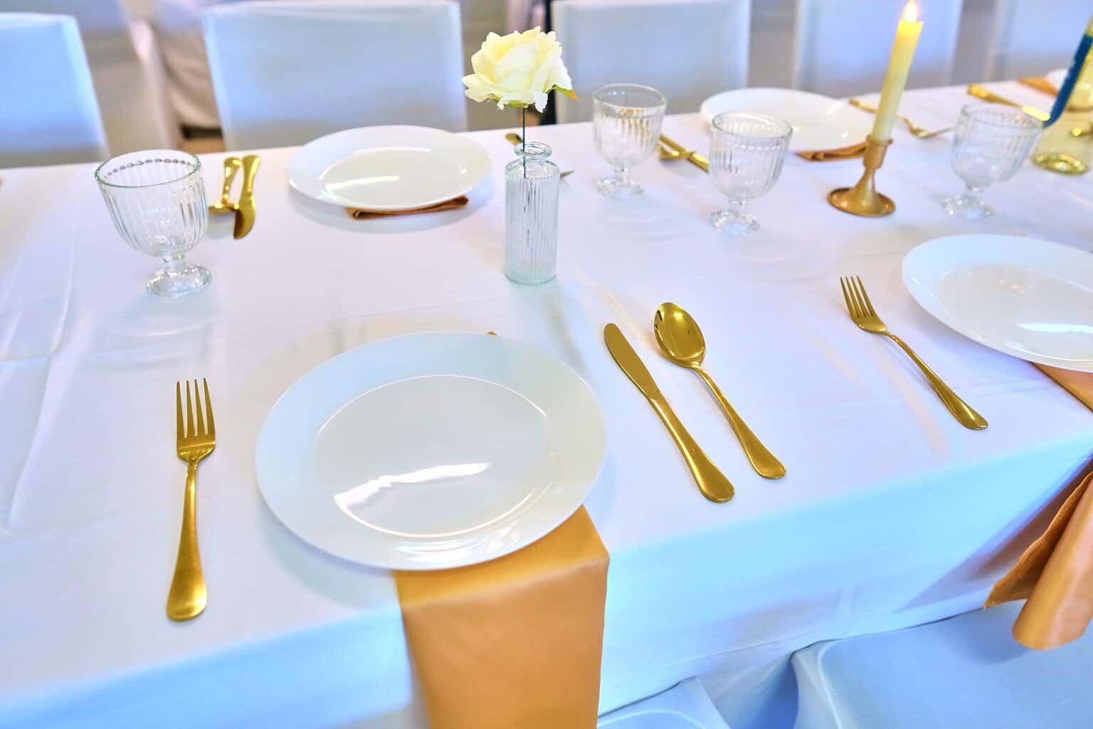 Elegant baby shower dining arrangement featuring luxurious linens