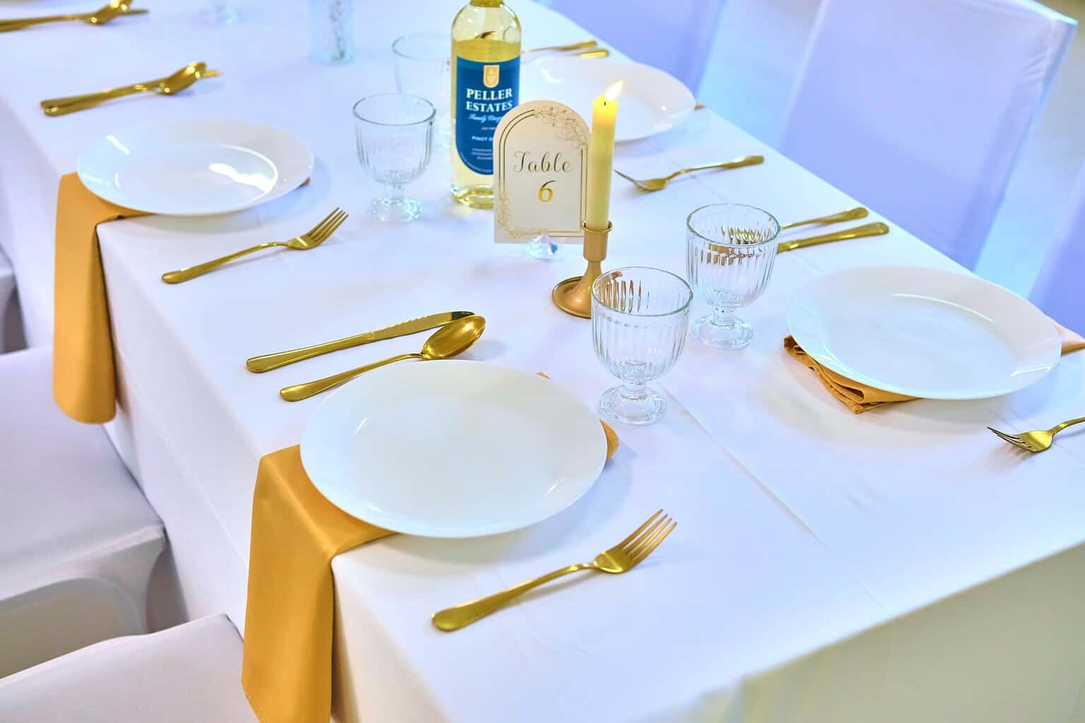 Luxury baby shower centerpiece with floral arrangements and premium linens