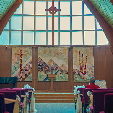 Formal dining tables at Atlantic School of Theology event